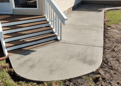 A curved concrete walkway and sidewalk at a home in Myrtle Beach South Carolina