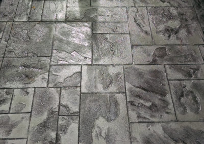stamped grey concrete patio