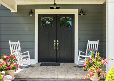 A textured and stamped concrete front porch of a traditional Carolinas home