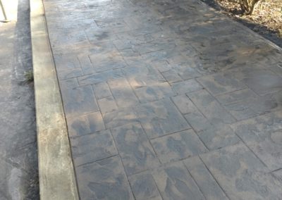 textured grey colored concrete walkway