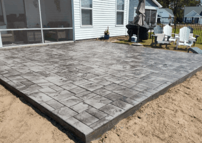 Wood grain textured concrete patio at a home in Conway, South Carolina